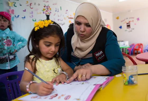 War Child education facilitator in temporary learning space in Iraq.