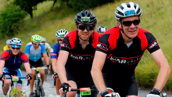 Two War Child cyclists taking on Ride London.