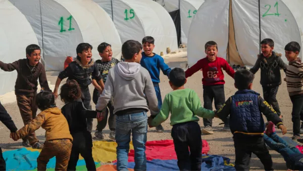 Children playing in a refugee camp in Syria. 