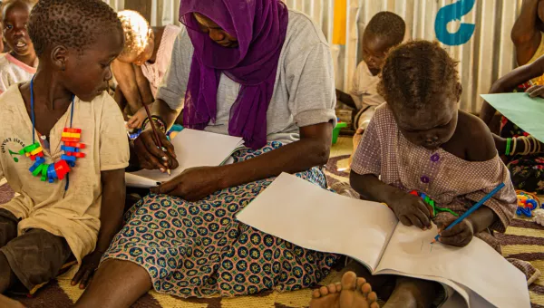 Children learning in a War Child supported school.