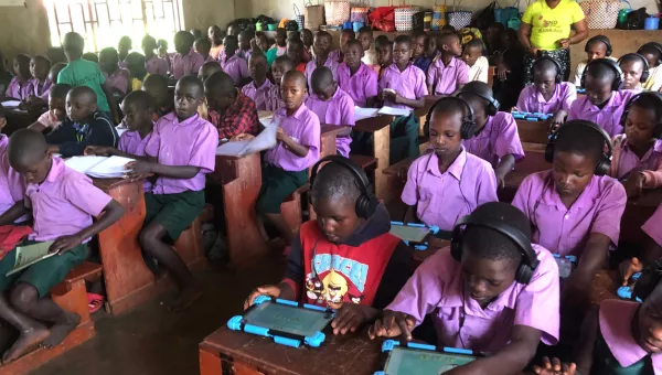 Children playing a Cant Wait To Learn game in Uganda.