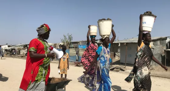 Women carrying goods in South Sudan. 